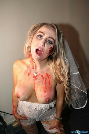 Blond wifey participates in a gang-bang while at a Halloween