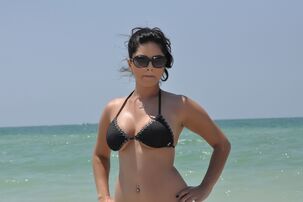 Indian pornography diva Sunny Leone on the gorgeous beach in