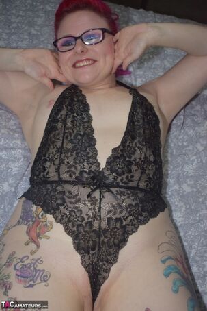 Inked inexperienced Mollie Foxxx models ebony underwear with