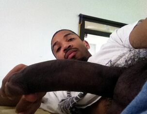 Black boys uncovering their ample erect Black meat