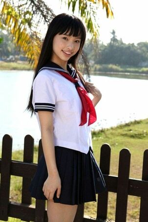 Uber-cute asian Seina Tsurumaki young woman posing outdoor..