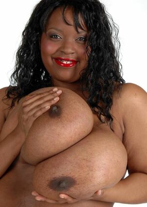 This dark-hued Plumper  her meaty balloons and she will