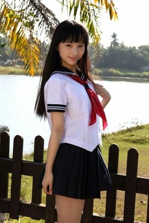Adorable chinese Seina Tsurumaki cherry posing outdoor in