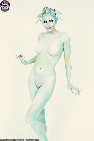 Pallid light-haired Eve Bennu wears no clothes during a