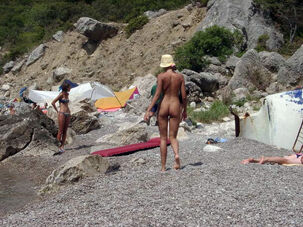 Totally bare Crimean honey on the beach at nude-in-russia