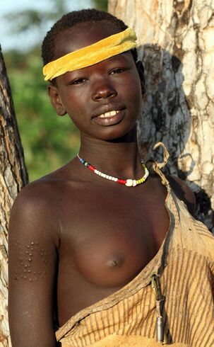 Naked tribe women, dark-hued african gals sans hooter-sling