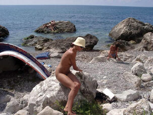 Downright bare Crimean stunner on the beach at