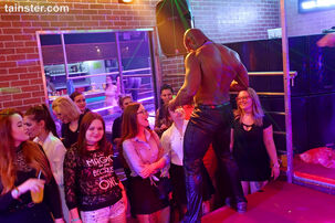 Unusual damsels drill with strippers in night club