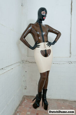 Tall slim model in dark-skinned spandex gimp costume & mask